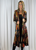 The scarf coat is made from a soft stretch viscose velvet fabric, with a beautiful all over brown autumnal design. Perfect for any autumn winter occasion, from a wedding Mother of the Bride, Mother of the Groom, Wedding Guest to a party or everyday wear. This coat will take you from day to night with effortless style and elegance.