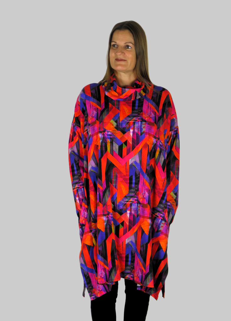 This cowl tunic is made from a soft feel red and pink jersey, with a beautiful all over abstract print. Perfect for any autumn winter occasion, from a wedding to any celebration to everyday wear. The tunic top will take you from day to night with effortless style and elegance.