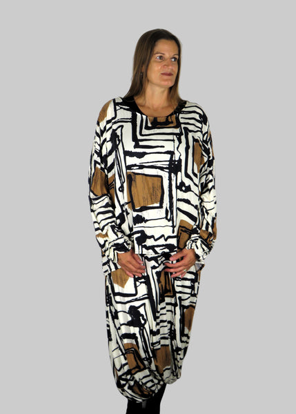 This dress has jersey top and beautiful white abstract balloon twist skirt, completing the look with the white abstract over top. Perfect for any autumn winter occasion, from a wedding, Mother of the Bride, Mother of the Groom, Wedding Guest to a party or everyday wear. This dress will take you from day to night with effortless style and elegance.