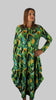 This hitch up dress is made from a soft feel jersey fabric, with an all over shades of green print. The dress has a hitch up hem on both sides, which can be buttoned up or let down for a longer length. Perfect for any autumn / winter occasion from a wedding, mother of the bride, mother of the groom to a party or everyday wear. This dress will take you from day to night with effortless style and elegance. Available in Abstract Aqua, Fuchsia, Green  & Fusion print and Aqua. 