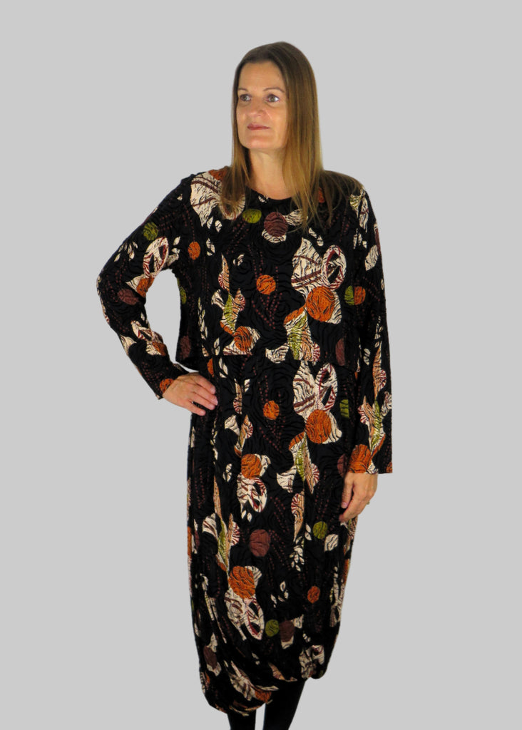This dress has jersey top and beautiful black embossed fabric balloon twist skirt, completing the look with the over top all in an autumnal print. Perfect for any autumn winter occasion, from a wedding, Mother of the Bride, Mother of the Groom, Wedding Guest to a party or everyday wear. This dress will take you from day to night with effortless style and elegance.