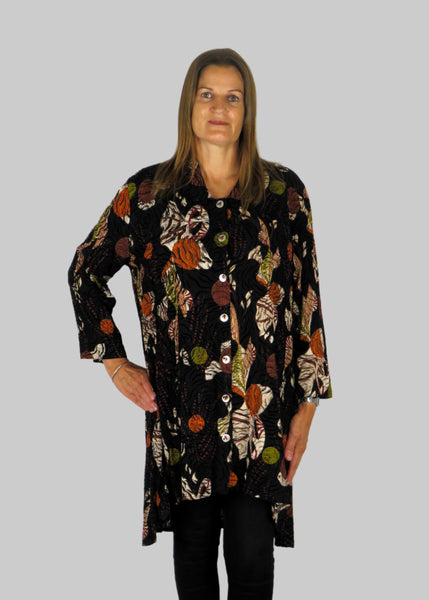 This tunic blouse is made from a embossed black autumnal print fabric. Perfect for any autumn winter occasion, from a party to everyday wear. This blouse will take you from day to night with effortless style and elegance.