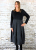 The 8 Panel Dress is made from a soft black cotton fabric with a marble effect skirt and jersey top. Perfect for any autumn / winter occasion from a wedding, mother of the bride, mother of the groom to a party or everyday wear. This dress will take you from day to night with effortless style and elegance.