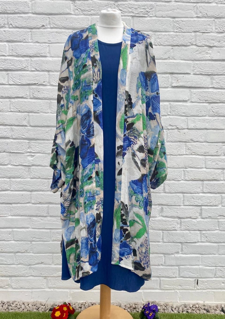 The long kimono is made from a soft printed blue chiffon with a beautiful all flower design. Perfect for any spring summer occasion, from a wedding - mother of the bride, mother of the groom and wedding guest to everyday wear. This kimono will take you from day to night with effortless style and elegance.