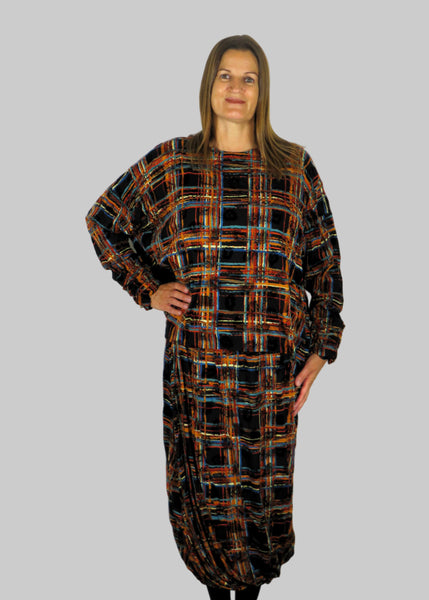 This wide top and balloon twist skirt are made from a beautiful embossed check fabric. Perfect for any autumn winter occasion, from a wedding, Mother of the Bride, Mother of the Groom, Wedding Guest to a party or everyday wear. This set will take you from day to night with effortless style and elegance.