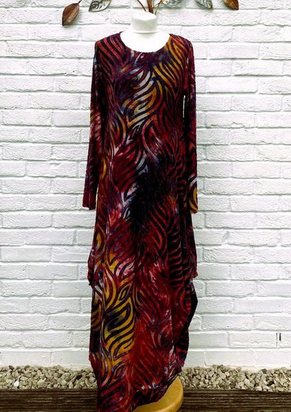 The dress is made from a soft feel jersey devore fabric, with an all over design. The dress has a hitch up hem on both sides, which can be buttoned up or let down for a longer length. Perfect for any autumn winter occasion, from a wedding Mother of the Bride, Mother of the Groom, Wedding Guest to a party or everyday wear. This dress will take you from day to night with effortless style and elegance.