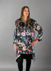 This Tunic Blouse is made from a black vegan habotai, with a beautiful brightly coloured flower design. Perfect for any autumn winter occasion, from a wedding to a party and everyday wear. This tunic blouse will take you from day to night with effortless style and elegance.