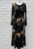 This dress is made from a soft stretch green viscose velvet fabric, with a beautiful all over butterfly design. Perfect for any autumn winter occasion, from a wedding Mother of the Bride, Mother of the Groom, Wedding Guest to a party or everyday wear. This dress will take you from day to night with effortless style and elegance.