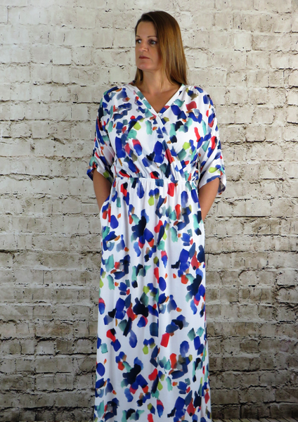 This wrap top dress is made from a soft feel jersey fabric, with a beautiful all over multi colour print. Perfect for any spring summer occasion or everyday wear. This dress will take you from day to night with effortless style and elegance. Available in black and white.