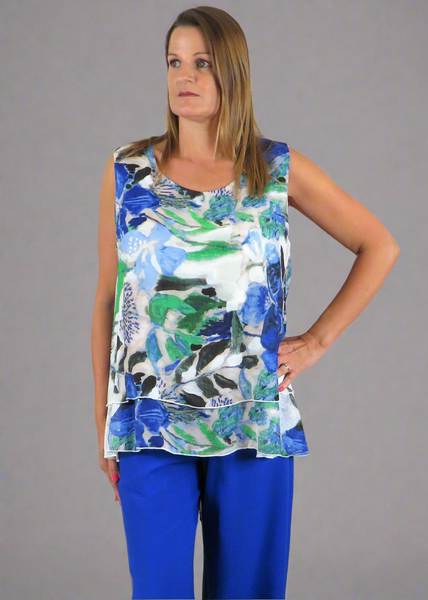 The Double Layer Top is made from a soft printed orange chiffon with a beautiful all flower design. Perfect for any spring summer occasion, from a wedding - mother of the bride, mother of the groom and wedding guest to everyday wear. This kimono will take you from day to night with effortless style and elegance.