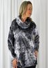 This wide top is made from a soft stretch viscose velvet fabric, with a beautiful all over silver autumnal design with a cowl neck. Perfect for any autumn winter occasion, from a party to everyday wear. This top will take you from day to night with effortless style and elegance.