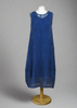 This sleeveless dress is made from a navy sheer fabric with a beautiful all over stripe design, with a soft viscose lining. Perfect for any spring summer occasion, from a wedding - mother of the bride, mother of the groom and wedding guest to everyday wear. This dress will take you from day to night with effortless style and elegance. A matching shrug is available.