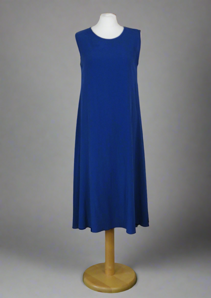 This sleeveless dress is made from a soft navy crepe fabric. Perfect for any spring summer occasion, from a wedding - mother of the bride, mother of the groom and wedding guest to everyday wear. This dress will take you from day to night with effortless style and elegance. A matching shrug is available.