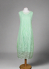 This sleeveless dress is made from a green sheer fabric with a beautiful all over stripe design, and a soft viscose lining. Perfect for any spring summer occasion, from a wedding - mother of the bride, mother of the groom and wedding guest to everyday wear. This dress will take you from day to night with effortless style and elegance. A matching shrug is available.