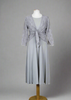 The shrug is made from a soft sheer silver fabric with a beautiful shell design. Perfect for any spring summer occasion, from a wedding - mother of the bride, mother of the groom and wedding guest to everyday wear. This shrug will take you from day to night with effortless style and elegance. Matching dresses available.