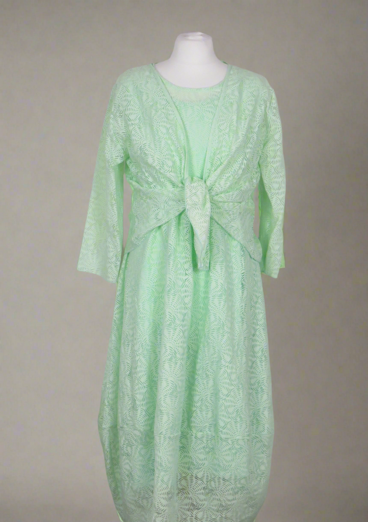The shrug is made from a soft sheer green fabric with a beautiful shell design. Perfect for any spring summer occasion, from a wedding - mother of the bride, mother of the groom and wedding guest to everyday wear. This shrug will take you from day to night with effortless style and elegance. Matching dresses available.