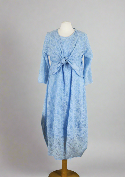 The shrug is made from a soft sheer blue fabric with a beautiful shell design. Perfect for any spring summer occasion, from a wedding - mother of the bride, mother of the groom and wedding guest to everyday wear. This shrug will take you from day to night with effortless style and elegance. Matching dresses available.
