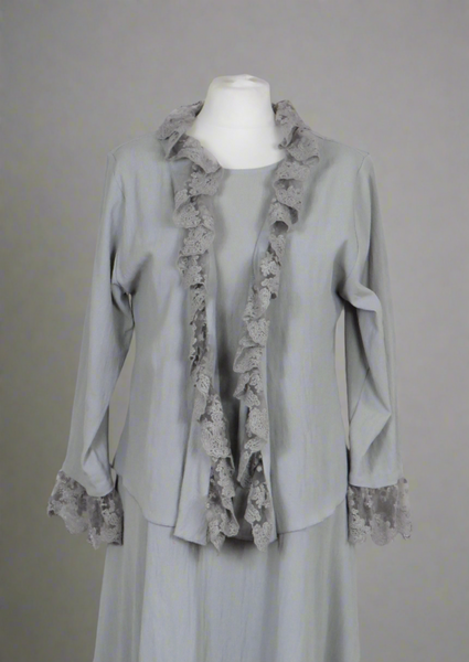 The shrug is made from a soft silver crepe fabric with a beautiful lace edge. Perfect for any spring summer occasion, from a wedding - mother of the bride, mother of the groom and wedding guest to everyday wear. This shrug will take you from day to night with effortless style and elegance. Matching dresses available.