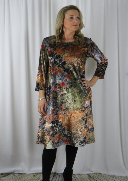 This dress is made from a soft stretch viscose velvet fabric, with a beautiful all over gold autumnal design. Perfect for any autumn winter occasion, from a wedding Mother of the Bride, Mother of the Groom, Wedding Guest to a party or everyday wear. This dress will take you from day to night with effortless style and elegance.