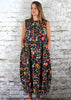 This sleeveless dress is made from a soft feel cotton fabric, with a beautiful all over flower print. Perfect for any spring summer occasion, from a wedding to a party and everyday wear. This dress will take you from day to night with effortless style and elegance.