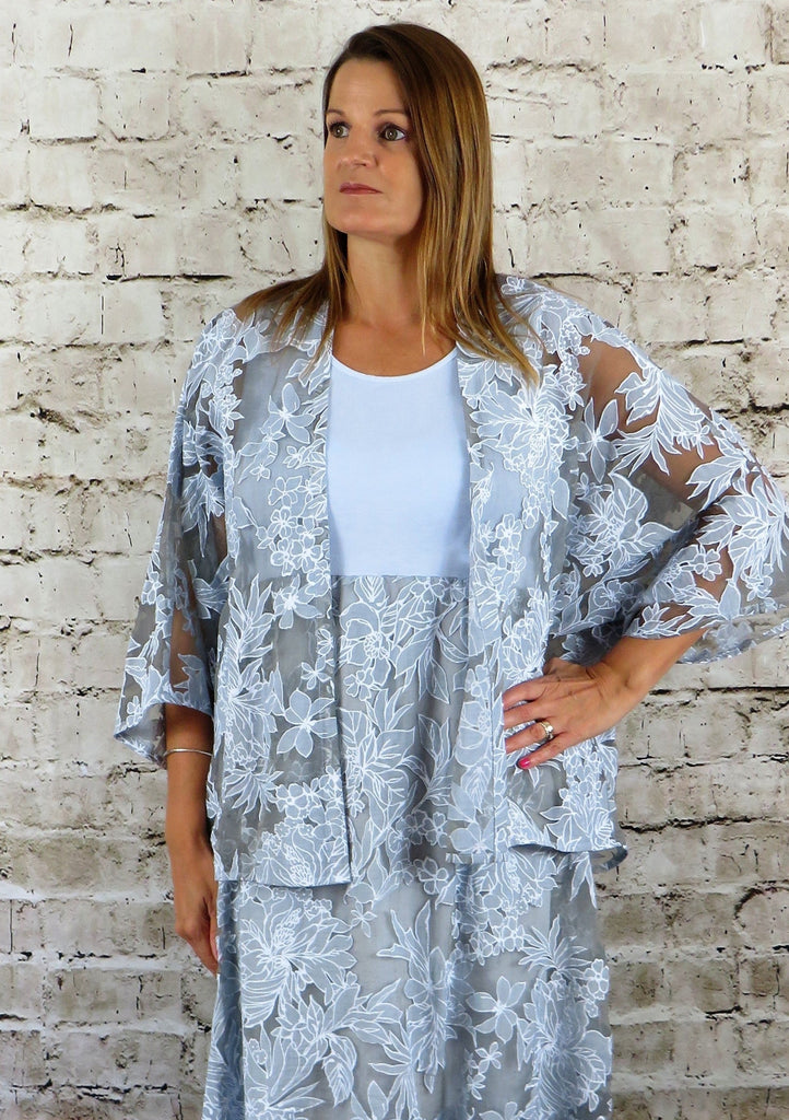 This kimono is made from a soft blue organza fabric, with a beautiful all over floral design. Perfect for any spring summer occasion, from a wedding - mother of the bride, mother of the groom and wedding guest to everyday wear. This kimono will take you from day to night with effortless style and elegance.