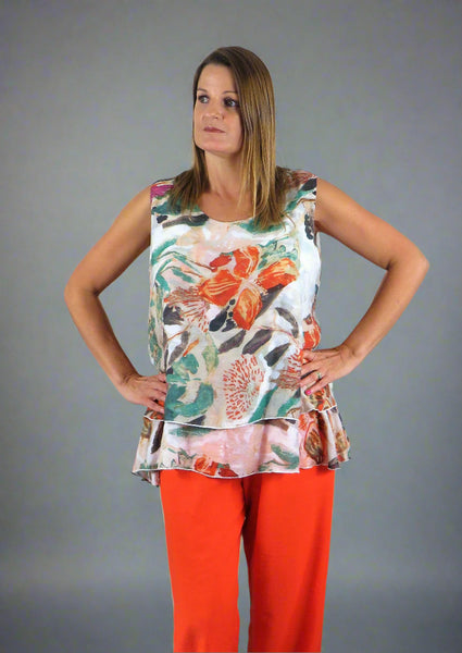 The Double Layer Top is made from a soft printed orange chiffon with a beautiful all flower design. Perfect for any spring summer occasion, from a wedding - mother of the bride, mother of the groom and wedding guest to everyday wear. This kimono will take you from day to night with effortless style and elegance.