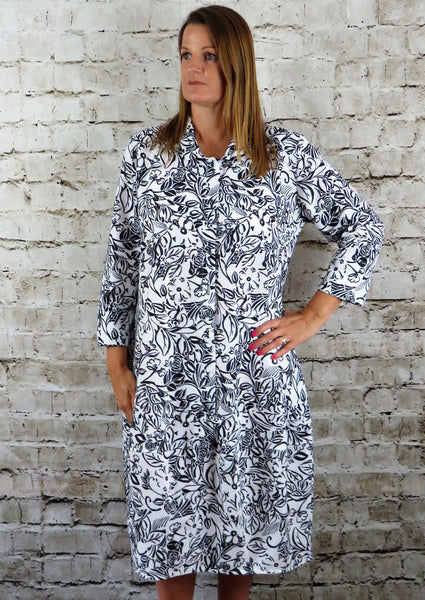 This button front dress is made from a soft white linen, with a beautiful all over flower print. Perfect for any occasion, from a wedding to everyday wear. This dress will take you from day to night with effortless style and elegance.