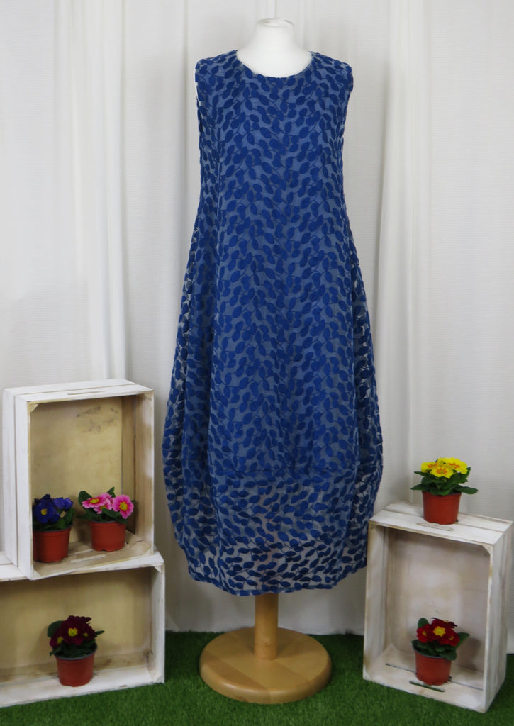 This sleeveless dress is made from a beautiful navy leaf embroidery with a viscose lining. Perfect for any spring summer occasion, from a wedding - mother of the bride, mother of the groom and wedding guest to everyday wear. This dress will take you from day to night with effortless style and elegance.
