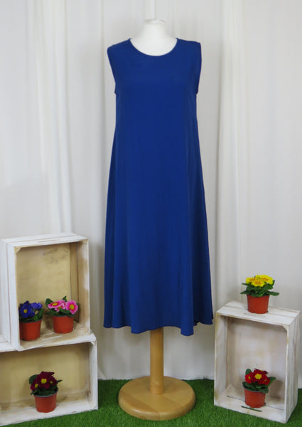 This sleeveless dress is made from a soft navy crepe fabric. Perfect for any spring summer occasion, from a wedding - mother of the bride, mother of the groom and wedding guest to everyday wear. This dress will take you from day to night with effortless style and elegance. A matching shrug is available.