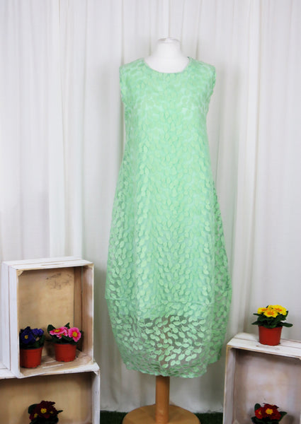 This sleeveless dress is made from a beautiful green leaf embroidery with a viscose lining. Perfect for any spring summer occasion, from a wedding - mother of the bride, mother of the groom and wedding guest to everyday wear. This dress will take you from day to night with effortless style and elegance.