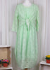 This sleeveless dress is made from a green sheer fabric with a beautiful all over shell design, and a soft viscose lining. Perfect for any spring summer occasion, from a wedding - mother of the bride, mother of the groom and wedding guest to everyday wear. This dress will take you from day to night with effortless style and elegance. A matching shrug is available.