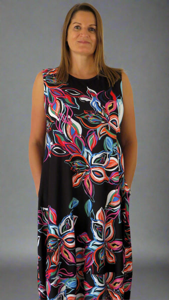 This black sleeveless dress is made from a soft feel Jersey fabric, with a beautiful all over multi colour print. Perfect for any spring summer occasion, from a wedding to everyday wear. This dress will take you from day to night with effortless style and elegance.
