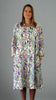 This coat dress is made from a soft feel white cotton fabric, with a beautiful all over flower print. Perfect for any spring summer occasion, from a wedding - mother of the bride, mother of the groom and wedding guest to everyday wear. This coat dress will take you from day to night with effortless style and elegance.