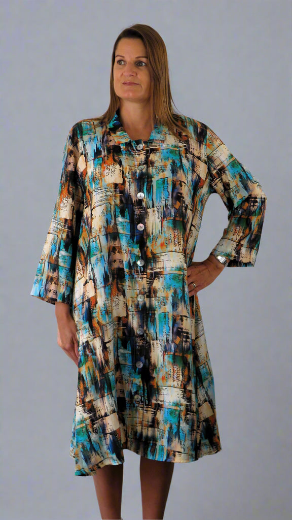 This button front dress is made from a soft viscose fabric, with an all over multi colour print. Perfect for any spring summer occasion or everyday wear. This dress will take you from day to night with effortless style and elegance.