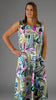 This sleeveless pocket dress is made from a soft white linen, with an all over colourful print. Perfect for any spring summer occasion or everyday wear. This dress will take you from day to night with effortless style and elegance.