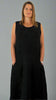 This black sleeveless dress is made from a soft feel tortoise shell fabric. Perfect for any spring summer occasion, from a wedding to everyday wear. This dress will take you from day to night with effortless style and elegance.