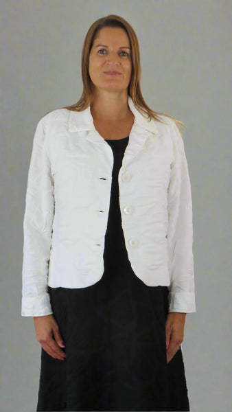 This jacket is made from a soft feel white tortoise shell pattern fabric. Perfect for any spring summer occasion, from a wedding - mother of the bride, mother of the groom and wedding guest to everyday wear. This jacket will take you from day to night with effortless style and elegance.