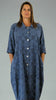 This button front dress has pockets and is made from a soft blue linen, with an all over cross stitch design. Perfect for any spring summer occasion or everyday wear. This dress will take you from day to night with effortless style and elegance