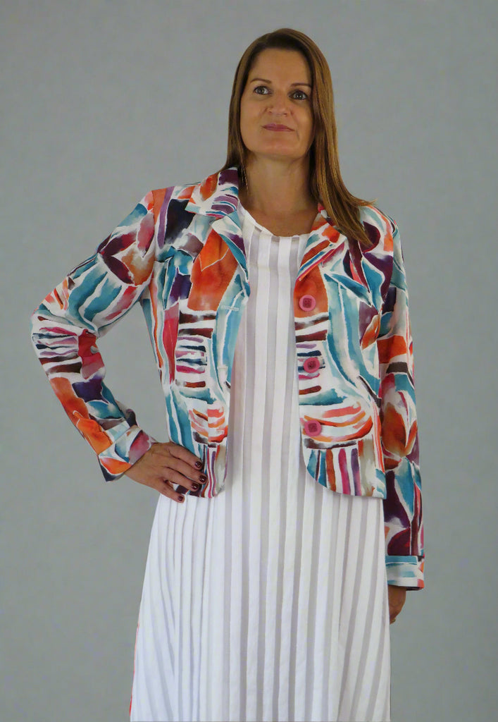 This jacket is made from a soft white linen, with a beautiful all over colourful print. Perfect for any spring summer occasion, from a wedding - mother of the bride, mother of the groom and wedding guest to everyday wear. This jacket will take you from day to night with effortless style and elegance.