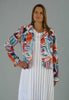 This jacket is made from a soft white linen, with a beautiful all over colourful print. Perfect for any spring summer occasion, from a wedding - mother of the bride, mother of the groom and wedding guest to everyday wear. This jacket will take you from day to night with effortless style and elegance.