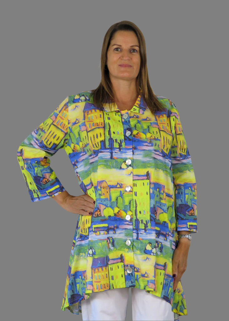 This Tunic shirt is made from a soft yellow viscose fabric, with a beautiful multi colour print. Perfect for any spring summer occasion, from a wedding to a party and everyday wear. This tunic blouse will take you from day to night with effortless style and elegance.