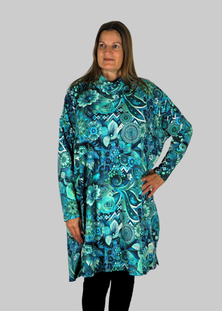 This cowl tunic is made from a soft feel blue jersey, with a beautiful all over blue and grey print. Perfect for any autumn winter occasion, from a wedding to any celebration to everyday wear. The tunic top will take you from day to night with effortless style and elegance.