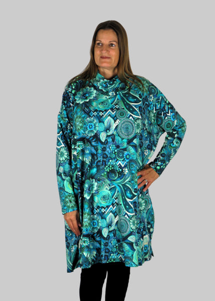 This cowl tunic is made from a soft feel blue jersey, with a beautiful all over blue and grey print. Perfect for any autumn winter occasion, from a wedding to any celebration to everyday wear. The tunic top will take you from day to night with effortless style and elegance.