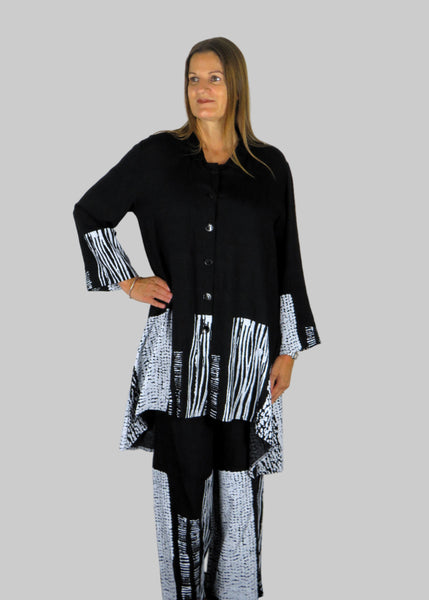 This tunic blouse and trousers are made from a beautiful cotton fabric in a black and white design. Perfect for any autumn winter occasion, from a party to everyday wear. This set will take you from day to night with effortless style and elegance.