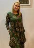 This dress is made from a soft feel  Jersey fabric, with a beautiful all over woodland print and pockets. Perfect for any autumn winter occasion, from a wedding to a party and everyday wear. This dress will take you from day to night with effortless style and elegance.