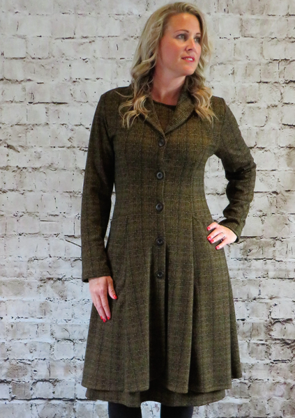 The Coat is made from a soft stretch gold cotton knitted fabric, with a beautiful all over check design. Perfect for any autumn winter occasion or everyday wear. This coat will take you from day to night with effortless style and elegance.