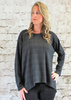 The wide top is made from a soft stretch grey knitted fabric, with a beautiful all over check design. Perfect for any autumn winter occasion or everyday wear. This top will take you from day to night with effortless style and elegance.