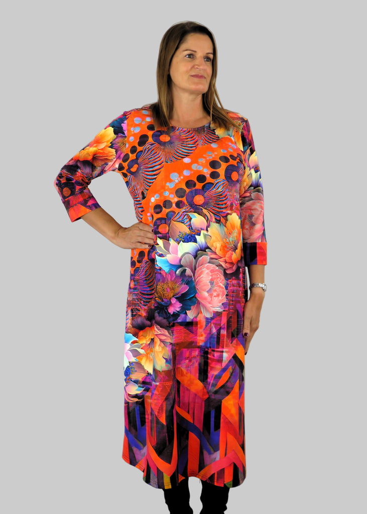 This panel dress is made from a soft feel jersey fabric, with an all over multicolour print. Perfect for any autumn / winter occasion from a wedding, mother of the bride, mother of the groom to a party or everyday wear. This dress will take you from day to night with effortless style and elegance.