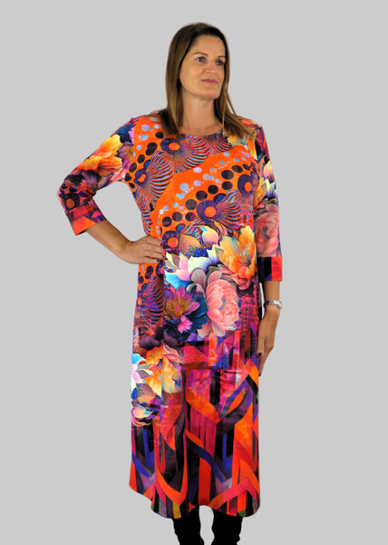 This panel dress is made from a soft feel jersey fabric, with an all over multicolour print. Perfect for any autumn / winter occasion from a wedding, mother of the bride, mother of the groom to a party or everyday wear. This dress will take you from day to night with effortless style and elegance.