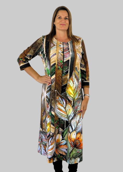 This panel dress is made from a soft feel jersey fabric, with an all over autumnal multicolour print. Perfect for any autumn / winter occasion from a wedding, mother of the bride, mother of the groom to a party or everyday wear. This dress will take you from day to night with effortless style and elegance